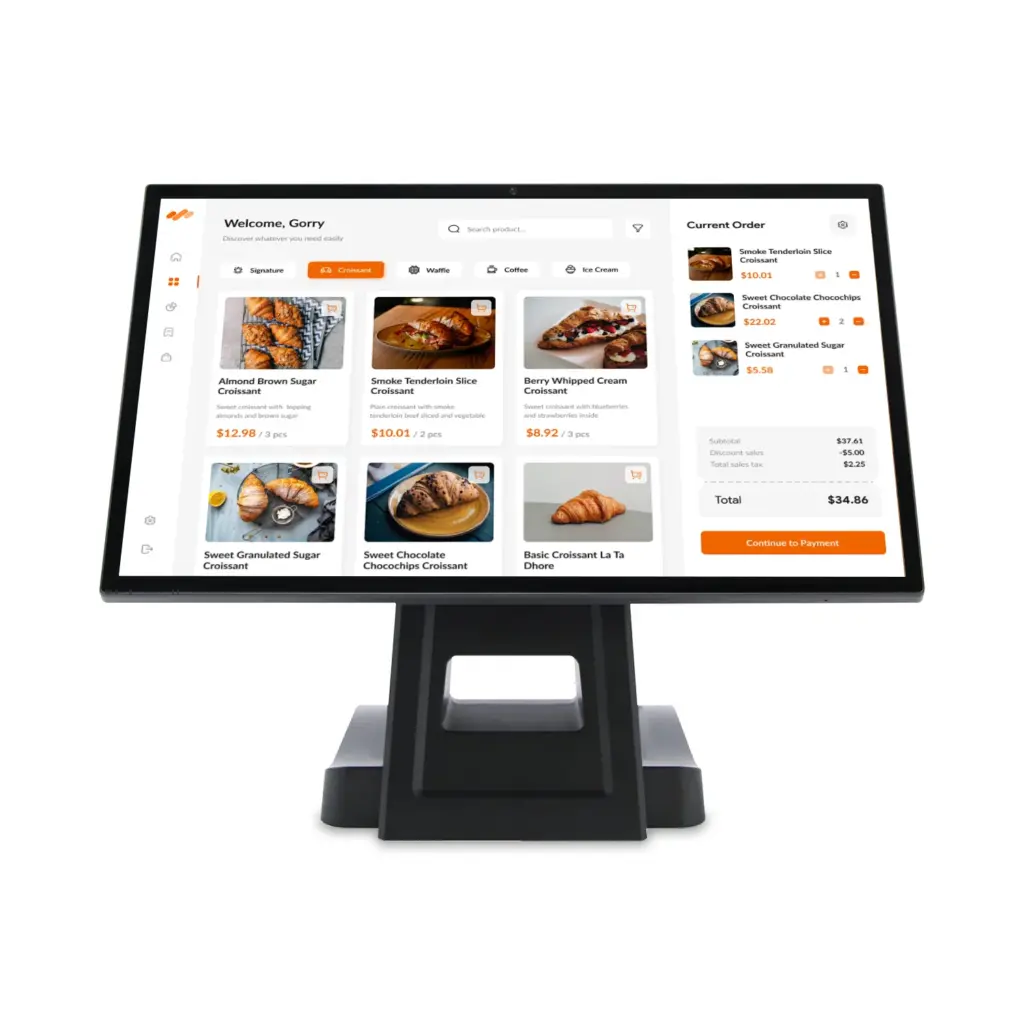 Touchscreen POS terminal displaying a bakery menu with croissant options and a current order summary on the right.